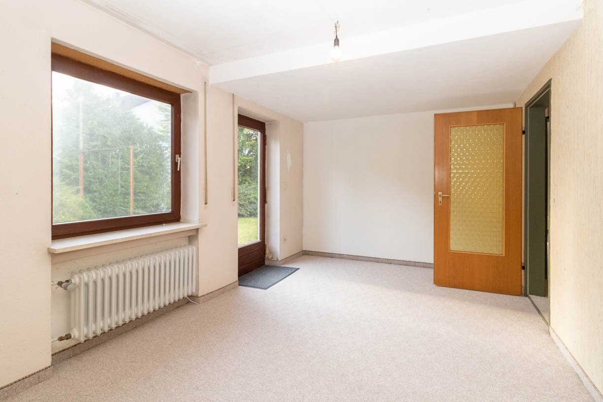Mehrgenerationenhaus in naturnaher Lage – mit Einliegerwohnung, außergewöhnlichen Raumhöhen und flexiblem Grundriss